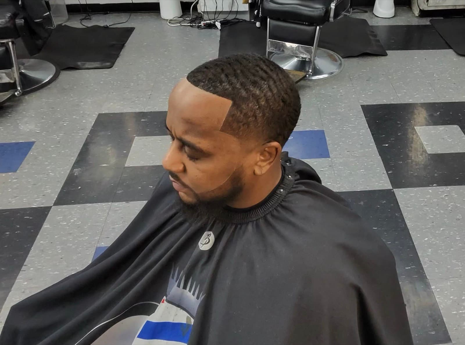 Razor Cutz shop floor — waves and fade finish